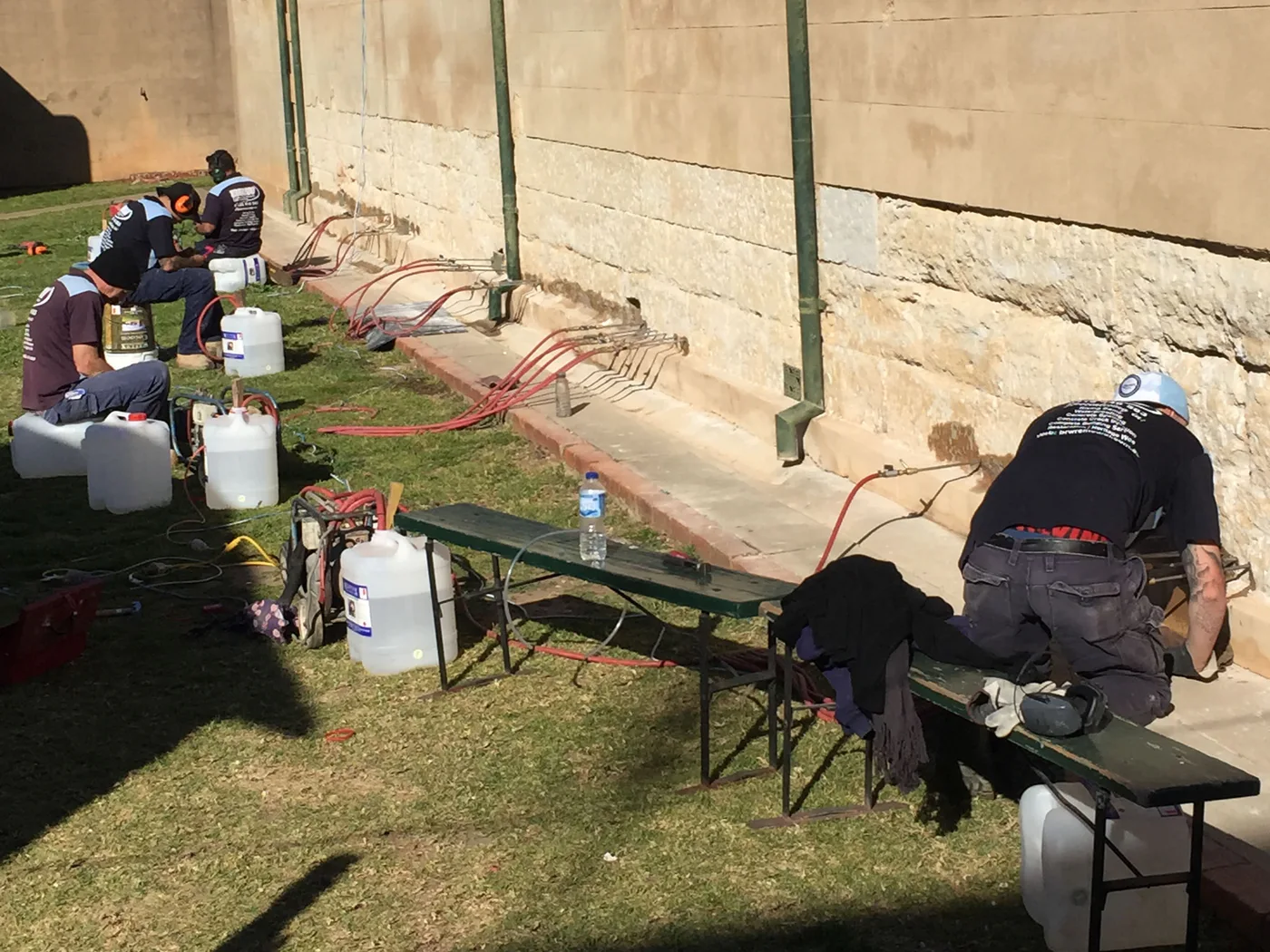Detailed heritage masonry undergoing damp restoration