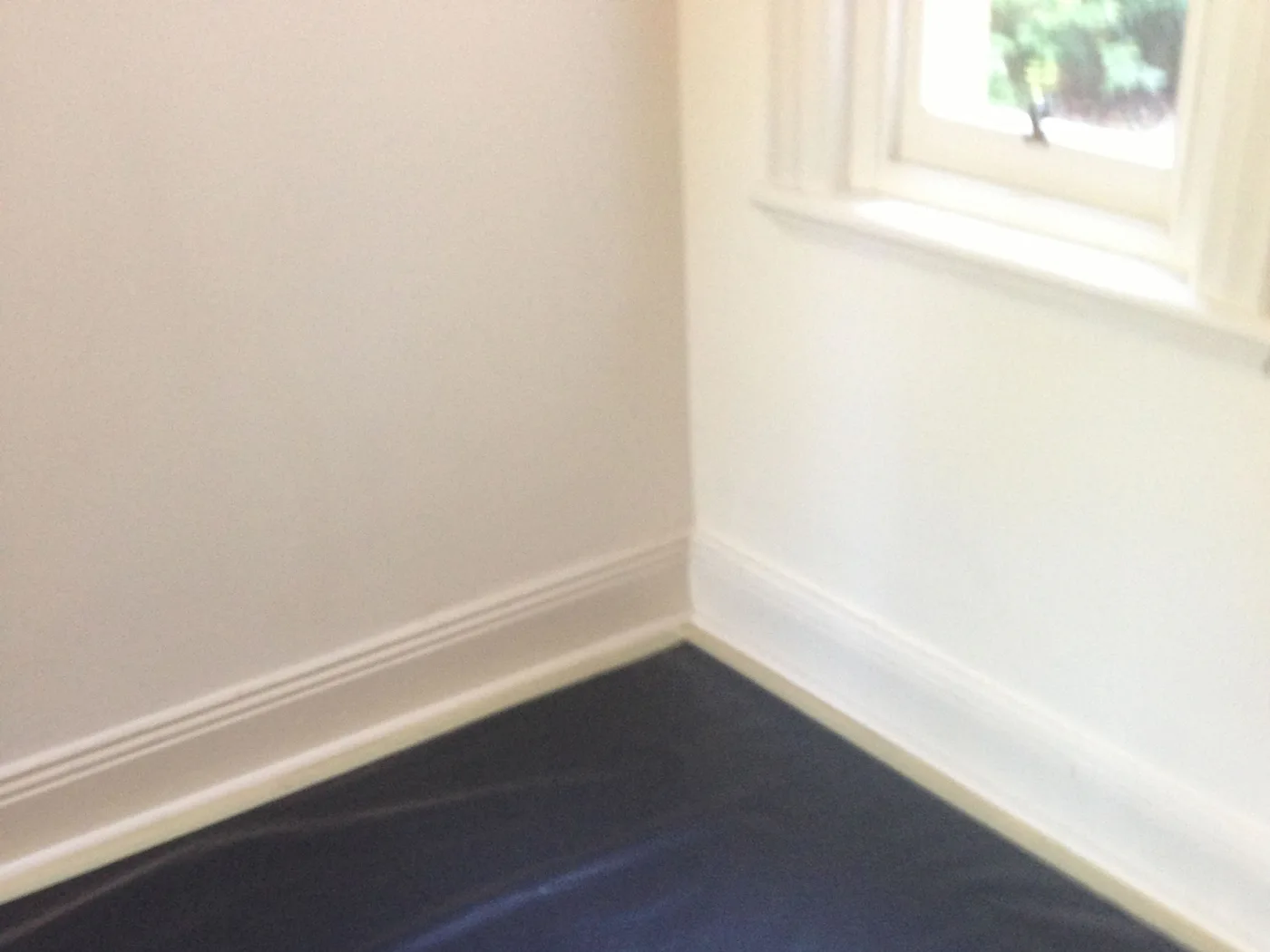 Interior wall prepared during rising damp treatment